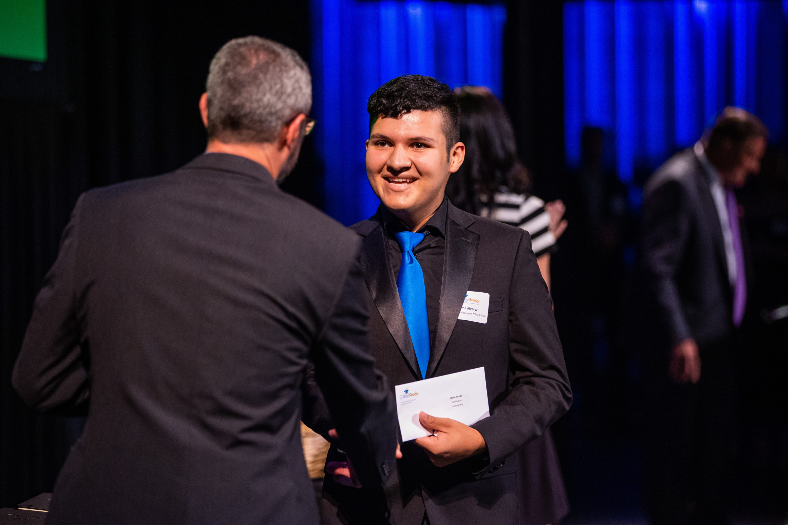 Scholarship Recipient Jaime receives his award letter at Lamp of Knowledge 2021